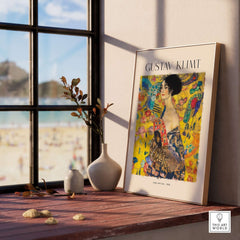 Gustav Klimt Lady with Fan Art Print 1918 - Art Nouveau Poster displayed in a bright room, showcasing vibrant colors.