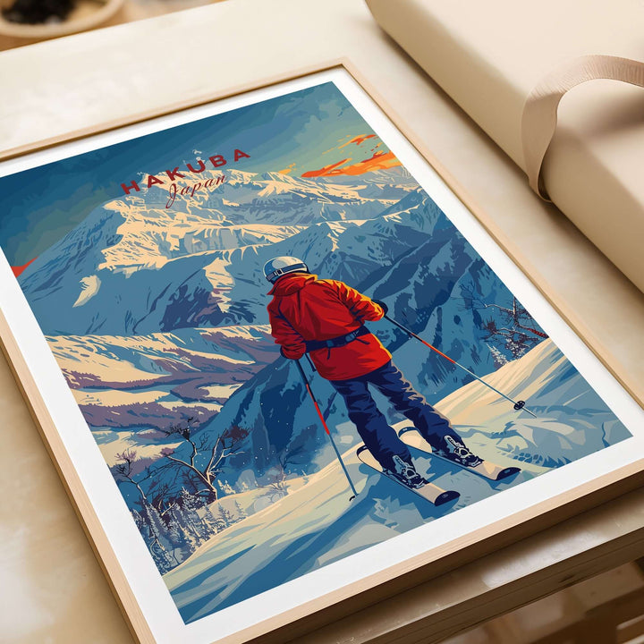 Hakuba ski poster featuring skier in red jacket overlooking snowy mountains with sunset background