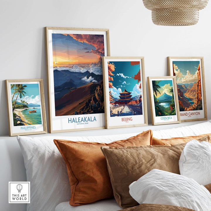 Haleakalā craters poster framed among other travel-themed prints on a stylish couch.