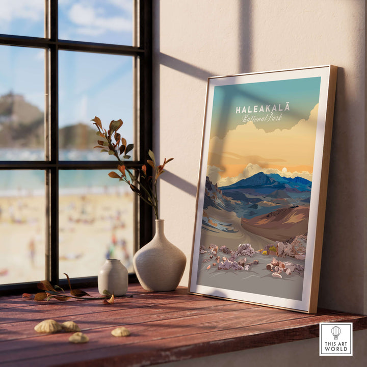 Haleakalā Volcano poster displayed on a wooden table by a window, showcasing Maui's stunning landscape art.