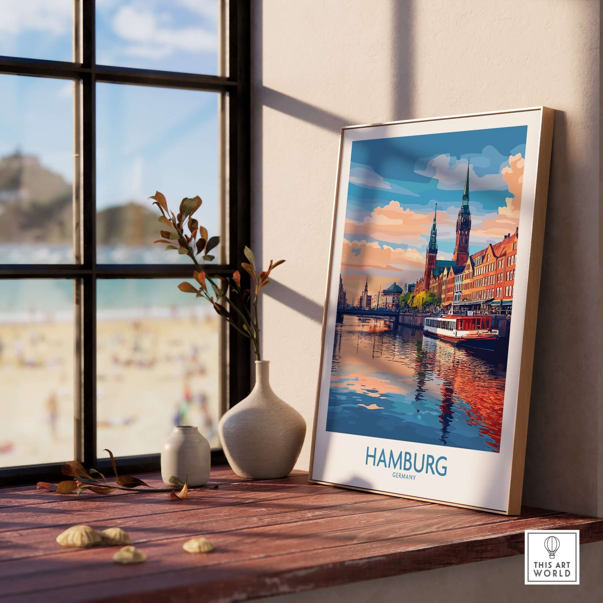 Hamburg Travel Poster showcasing iconic landmarks and vibrant colors, framed on a windowsill with a beach view.
