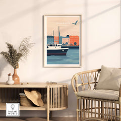 Hamburg Wall Art featuring a scenic view of a boat on the water with colorful buildings in the background.