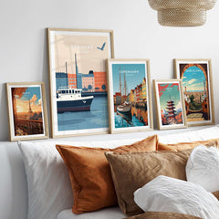 Hamburg Wall Art featuring beautiful city depictions in stylish frames on a cozy bed setting.