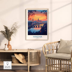 Hanover Travel Poster showcasing a vibrant sunset over the iconic skyline in a stylish interior setting.