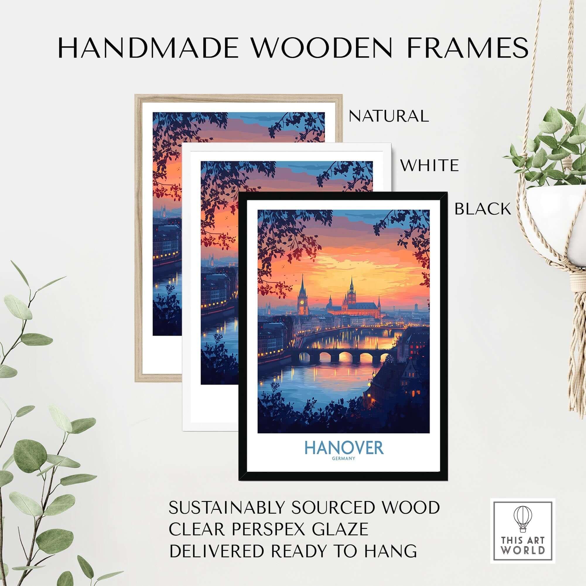 Hanover Travel Poster displayed in three handmade wooden frames: natural, white, and black, featuring a sunset and skyline.