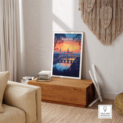 Hanover Travel Print showcasing the stunning sunset and skyline in a cozy interior setting.