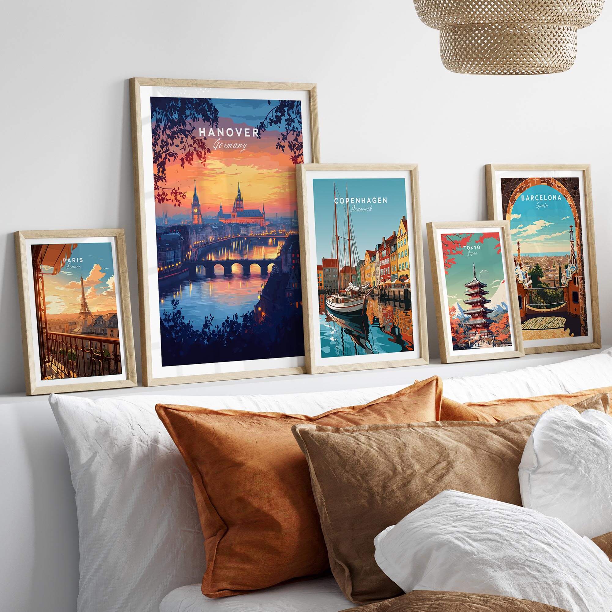 Hanover Travel Print showcased among other city travel prints on a cozy wall display, featuring vibrant sunset colors.
