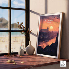 Hanover Wall Art featuring a vibrant sunset over Hanover skyline in a stylish frame on a wooden table.
