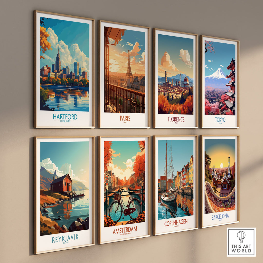 Gallery wall with travel posters of Hartford, Paris, Florence, Tokyo, Reykjavik, Amsterdam, Copenhagen, and Barcelona.