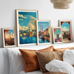 Helsinki Travel Print - Finland showcased in a stylish room with other travel posters and decorative pillows.