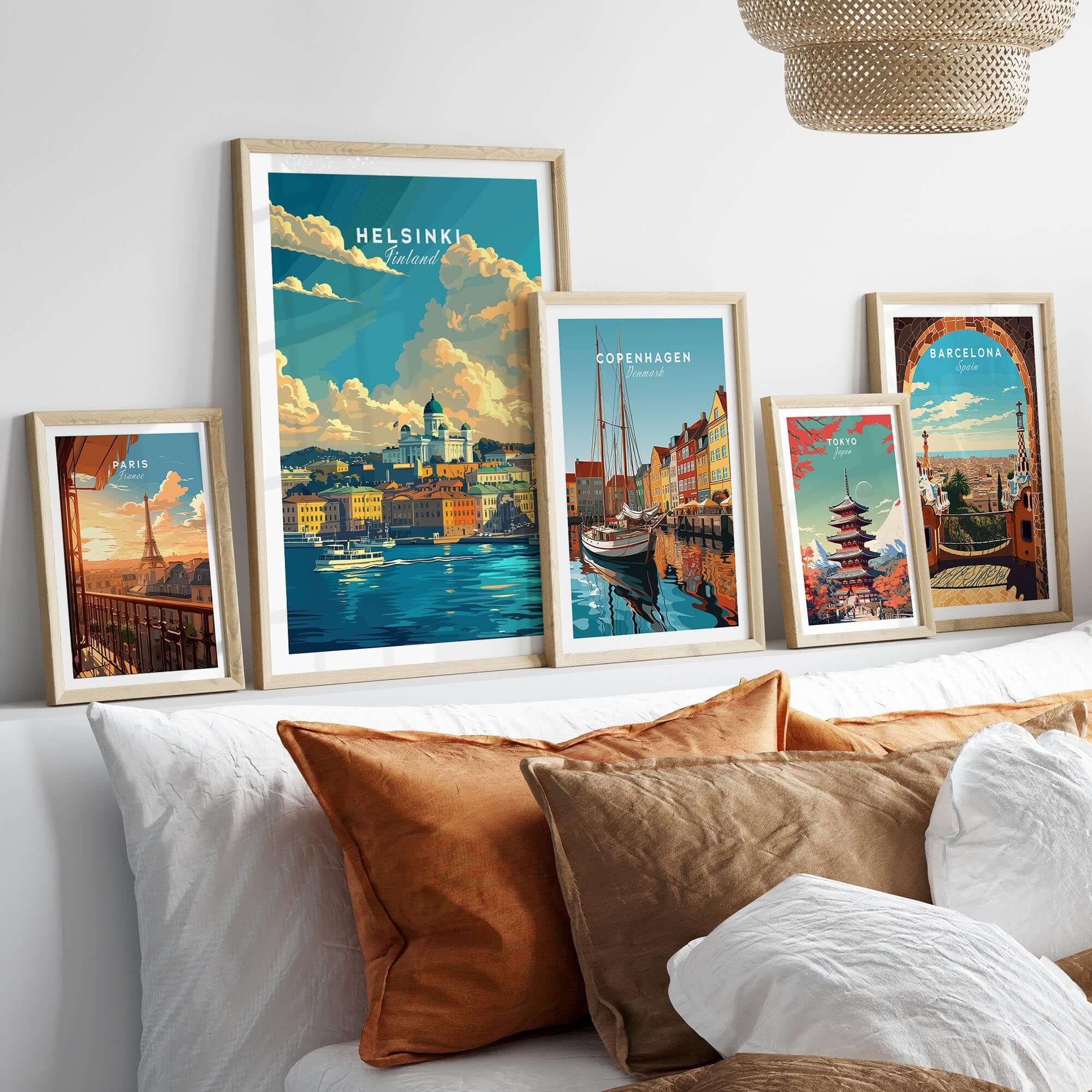 Helsinki Travel Print - Finland showcased in a stylish room with other travel posters and decorative pillows.