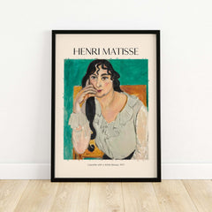 Matisse Poster  - Laurette with a White Blouse 1917 Art Print featuring an elegant woman in contemplation.