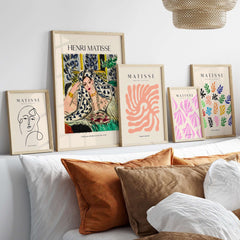 Matisse Poster  - Odalisque with Black Armchair 1942 Art Print displayed on a modern wall with other artwork.