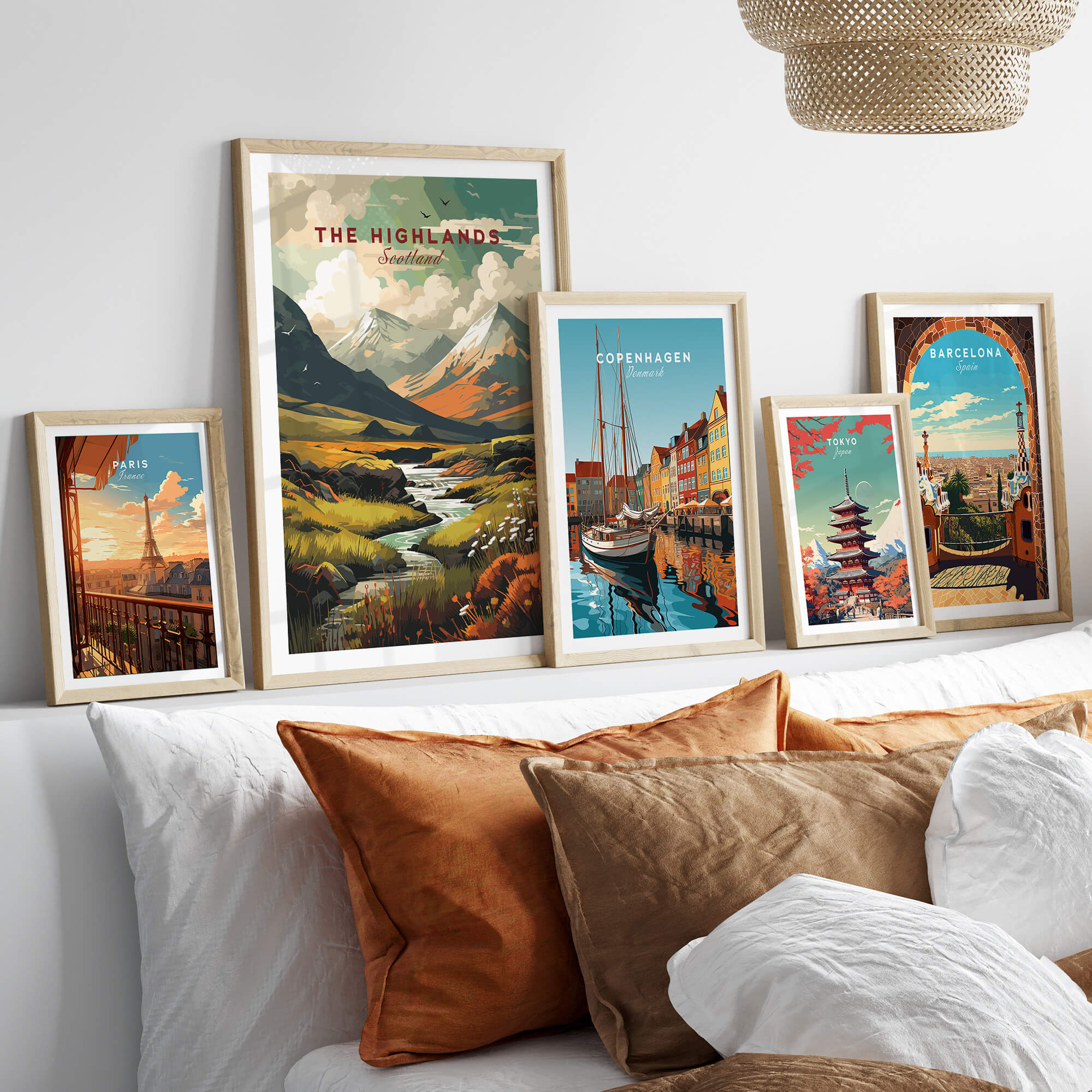 The Highlands Scotland Autumn Valley | Scottish Travel Wall Decor displayed with other travel prints in a cozy interior setting.