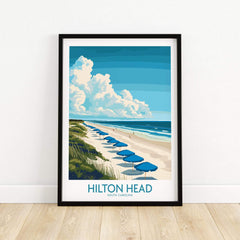 Hilton Head Travel Poster featuring a scenic beach view with blue umbrellas and beautiful clouds.