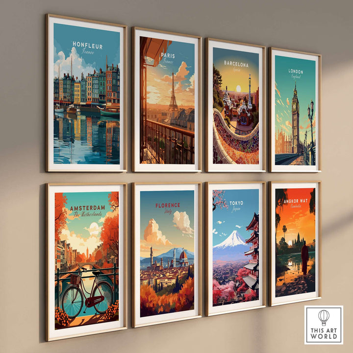 Gallery wall featuring various travel art prints including Honfleur, Paris, Barcelona, and Tokyo.
