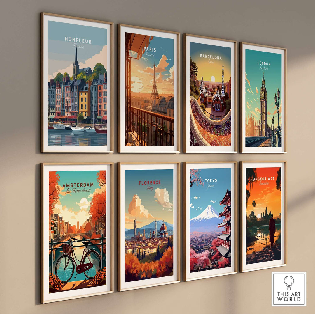 Gallery wall featuring iconic city posters: Honfleur, Paris, Barcelona, London, Amsterdam, Florence, Tokyo, Angkor Wat.