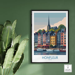Honfleur Town Poster - French Village Art Print - Normandy Travel Decor displayed on a green wall with plants.