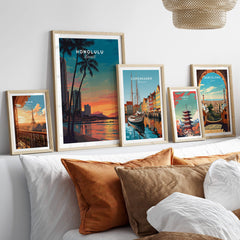 Honolulu Hawaii Travel Poster | Waikiki Sunset Cityscape Wall Art Print showcased among other travel posters in a modern interior.