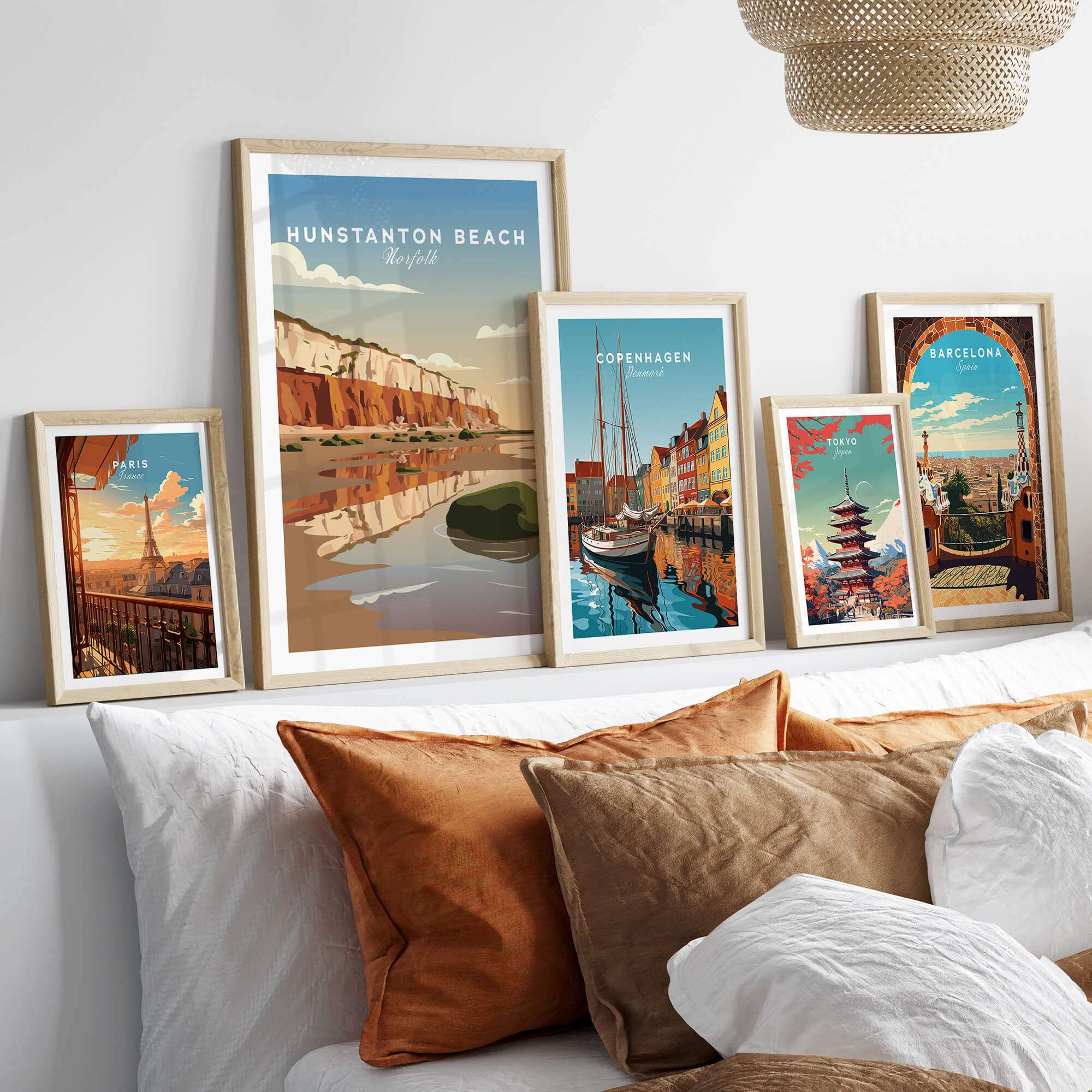 Hunstanton Beach Norfolk Wall Art Print | Red Cliffs Coastal Travel Poster displayed among various framed travel art prints.
