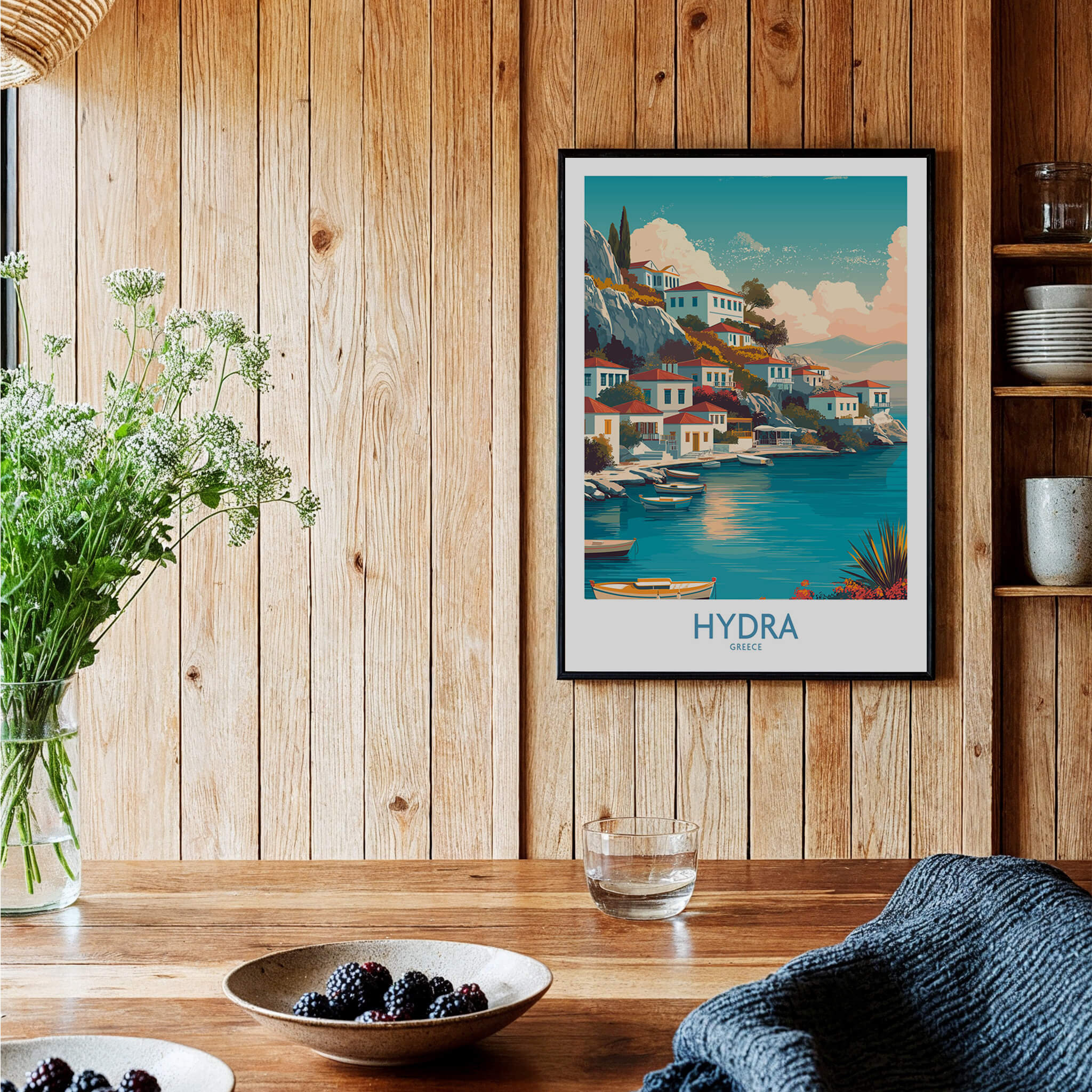 Hydra Greece Canvas Print | Blue Sea & White Architecture Poster displayed in a cozy interior with wooden accents.