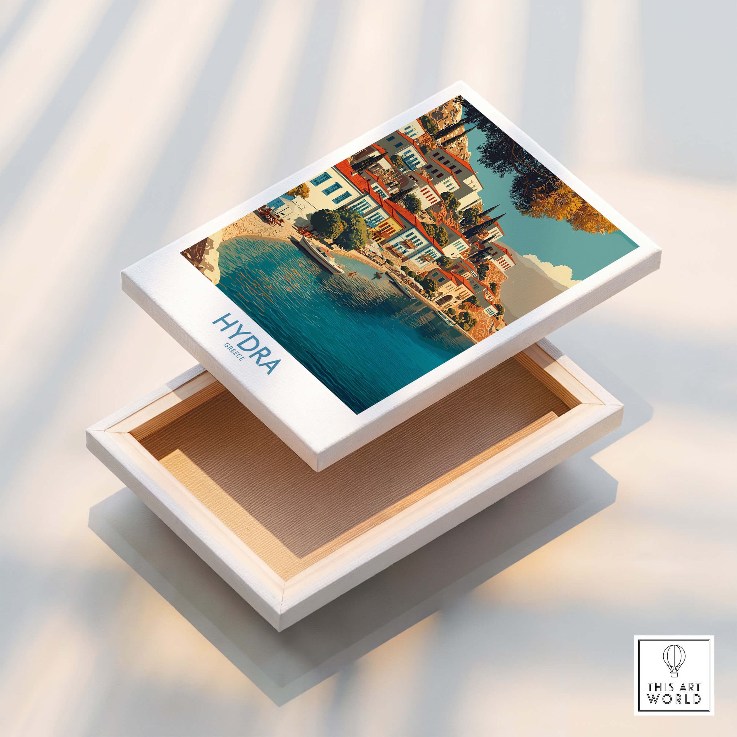 Hydra Greece Canvas Print | Mediterranean Seaside Town Poster displayed in an open box, showcasing picturesque waterfront view.