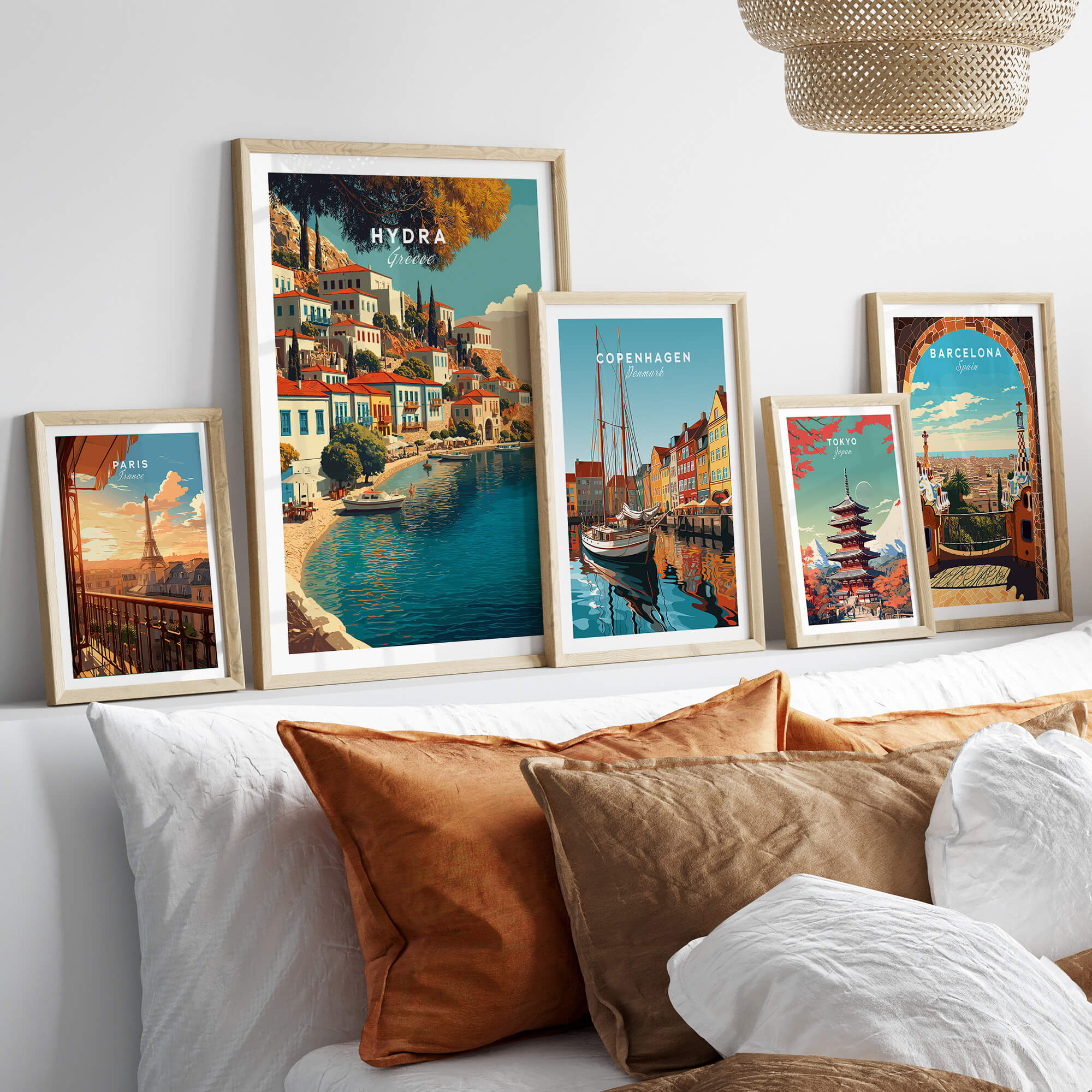 Hydra Greece Travel Poster | Harbor Side Promenade Wall Art Print displayed on a cozy couch with stylish decor.