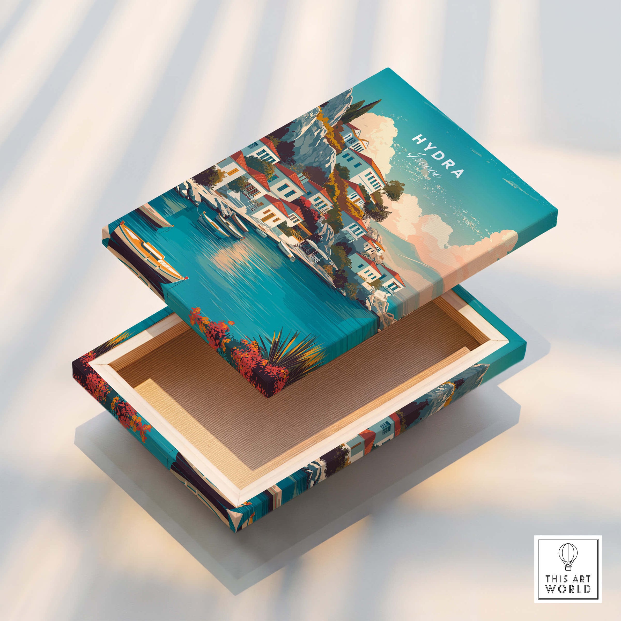 Hydra Greece Travel Poster | Waterfront Village Wall Art Print displayed on a decorative box showcasing vibrant island scenery.