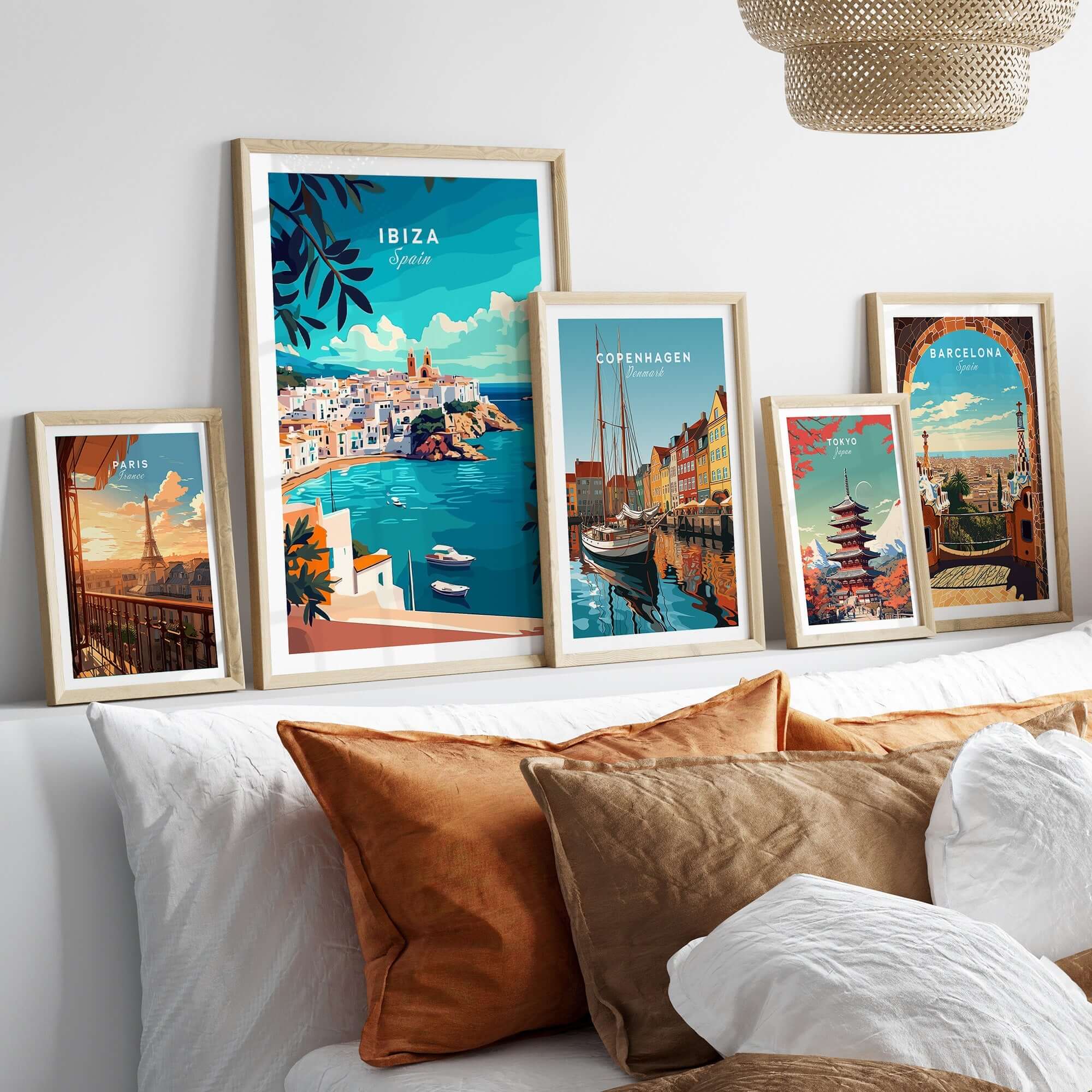 Ibiza Spain Travel Print wall art featuring vibrant illustrations of Ibiza, Denmark and Barcelona in stylish frames.