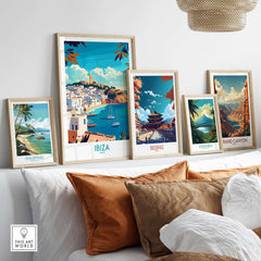 Ibiza Travel Poster spain displayed among other travel posters on a stylish living room wall.