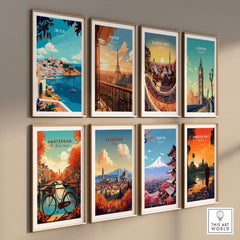 Ibiza Travel Print and other city travel prints displayed in frames on a wall, showcasing vibrant colors and designs.