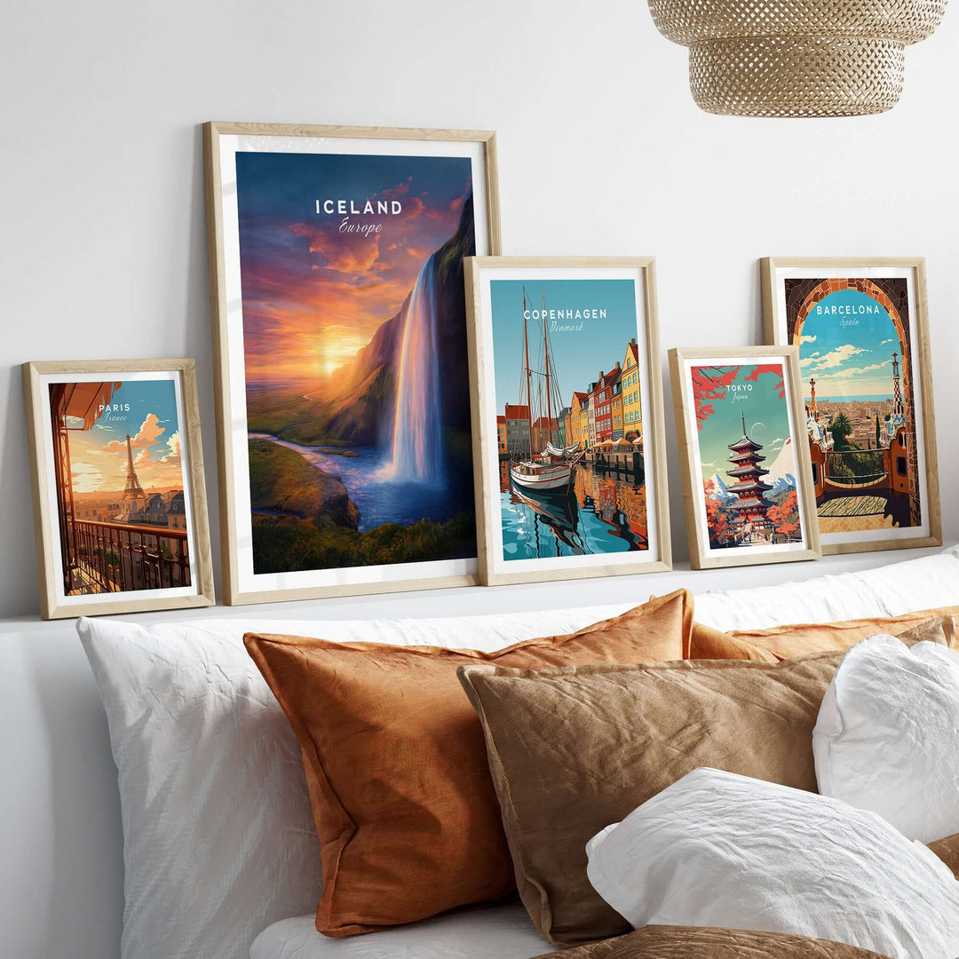 Iceland Poster | Icelandic Home Wall Art displayed among framed travel posters on a cozy sofa.