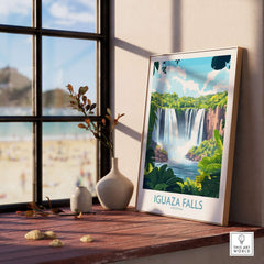 Iguazu Falls Travel Poster displayed on a wooden table with a view of a beach through the window.