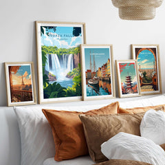 Iguazu Falls Travel Print displayed among other travel prints in a modern home setting.
