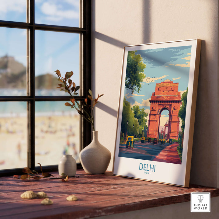 Delhi India Gate cityscape poster with auto-rickshaws, framed in a cozy interior setting.