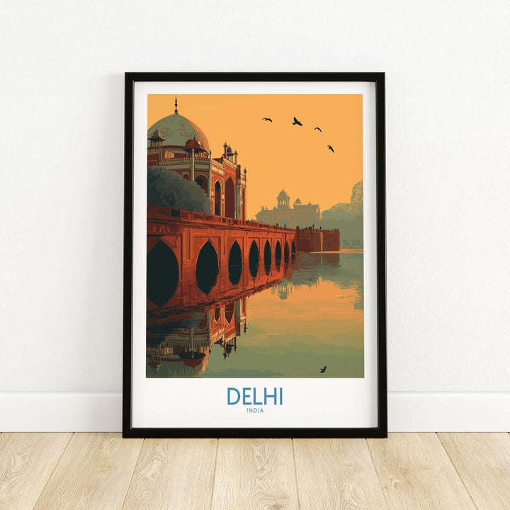 Framed travel poster of Humayun's Tomb in Delhi, showcasing a sunset reflection over water and silhouetted birds.