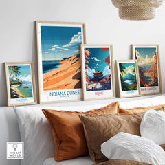 Indiana Dunes Travel Poster displayed among other travel posters on a stylish shelf in a cozy living space.