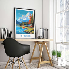 Interlaken Poster Switzerland displayed in a stylish workspace with scenic mountain view.