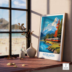 Interlaken Poster Switzerland displayed in a sunny room, featuring a scenic train and mountains.