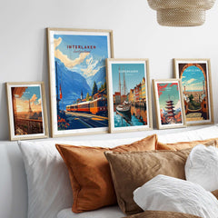 Interlaken Wall Art featuring beautiful landscape in frames on a cozy bed with pillows.
