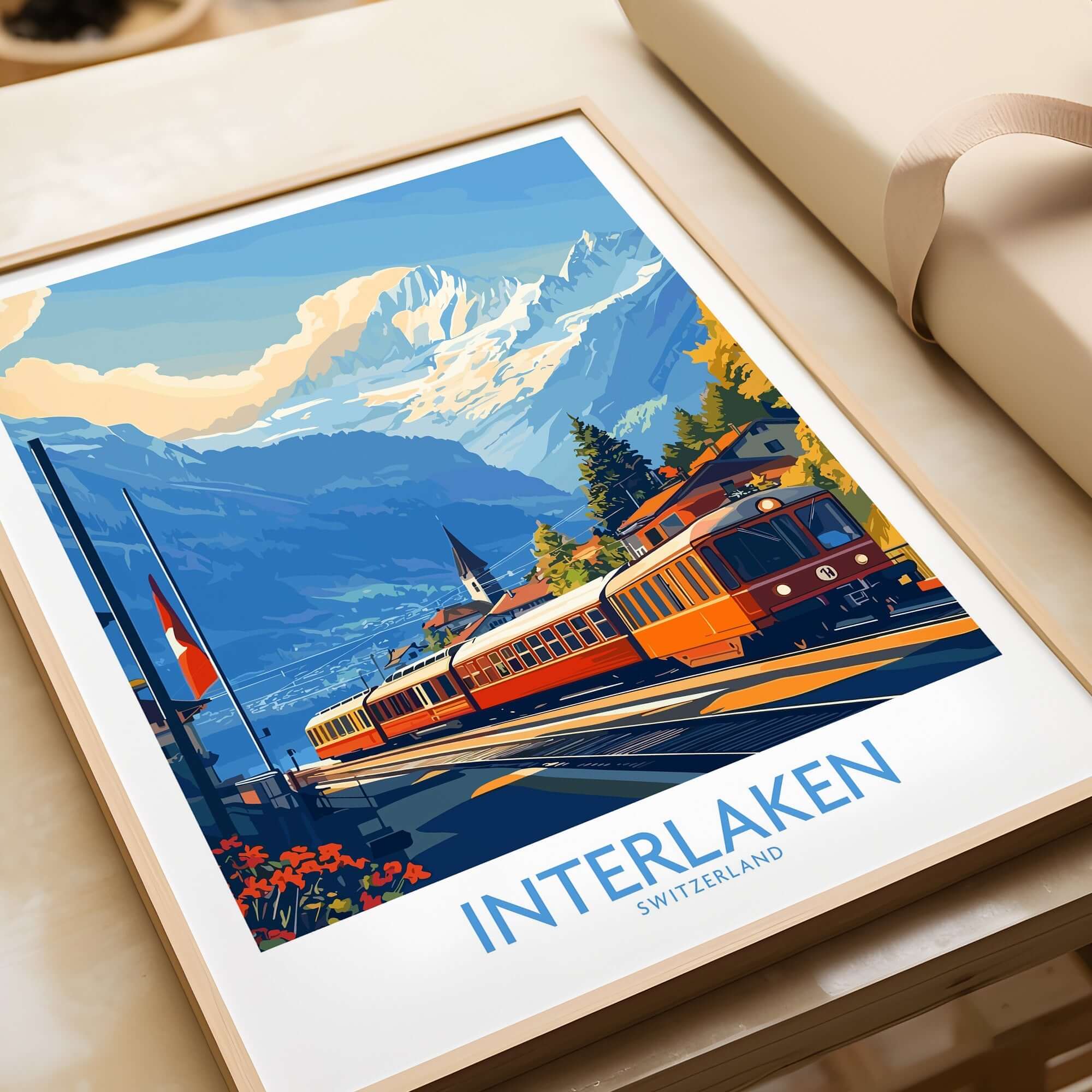 Interlaken Wall Art Print featuring a vintage train and stunning Alpine scenery of Switzerland.