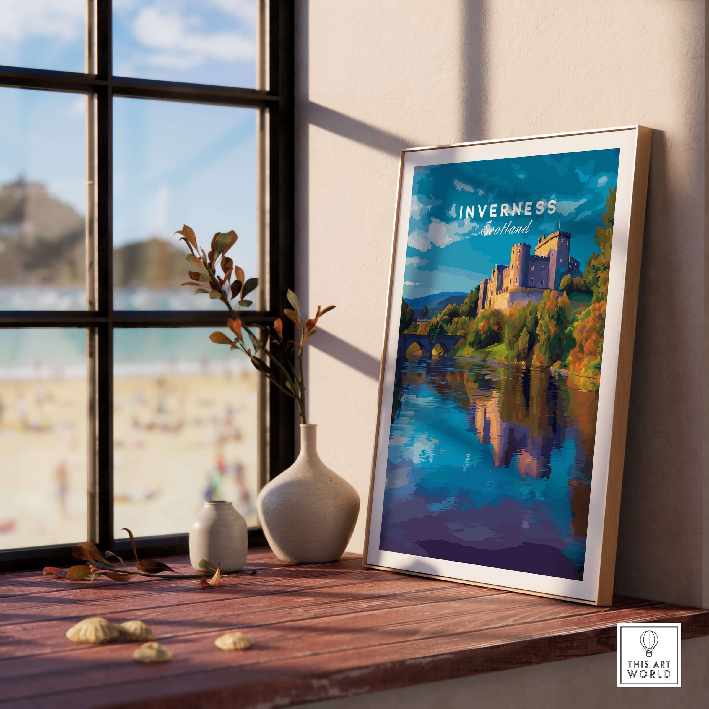 Inverness Print | Scottish Castle Wall Decor displayed on a windowsill with a scenic background.