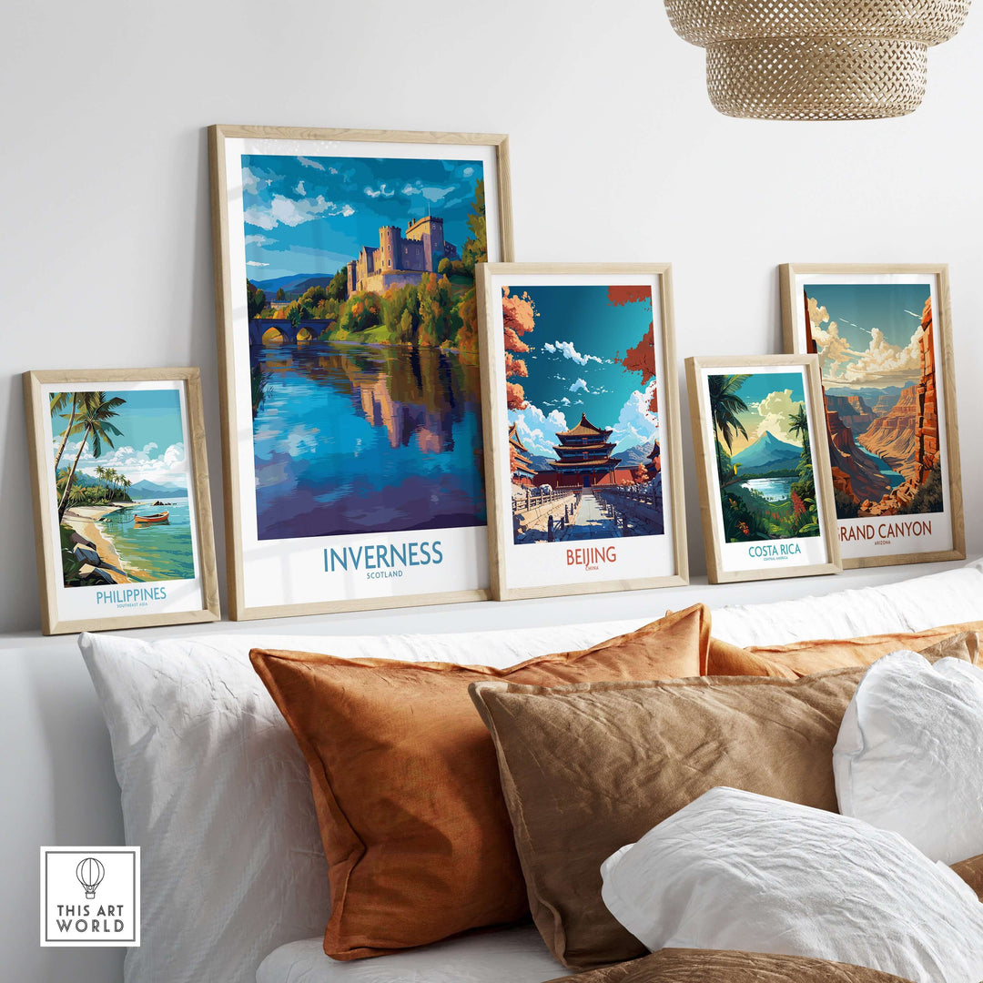 Inverness Scotland Art Print | Highland Landmark Poster displayed among other travel art prints on a cozy sofa.