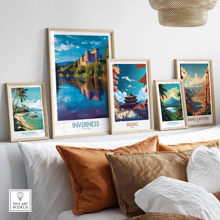 Inverness Scotland Art Print | Highland Landmark Poster displayed among other travel art prints on a cozy sofa.