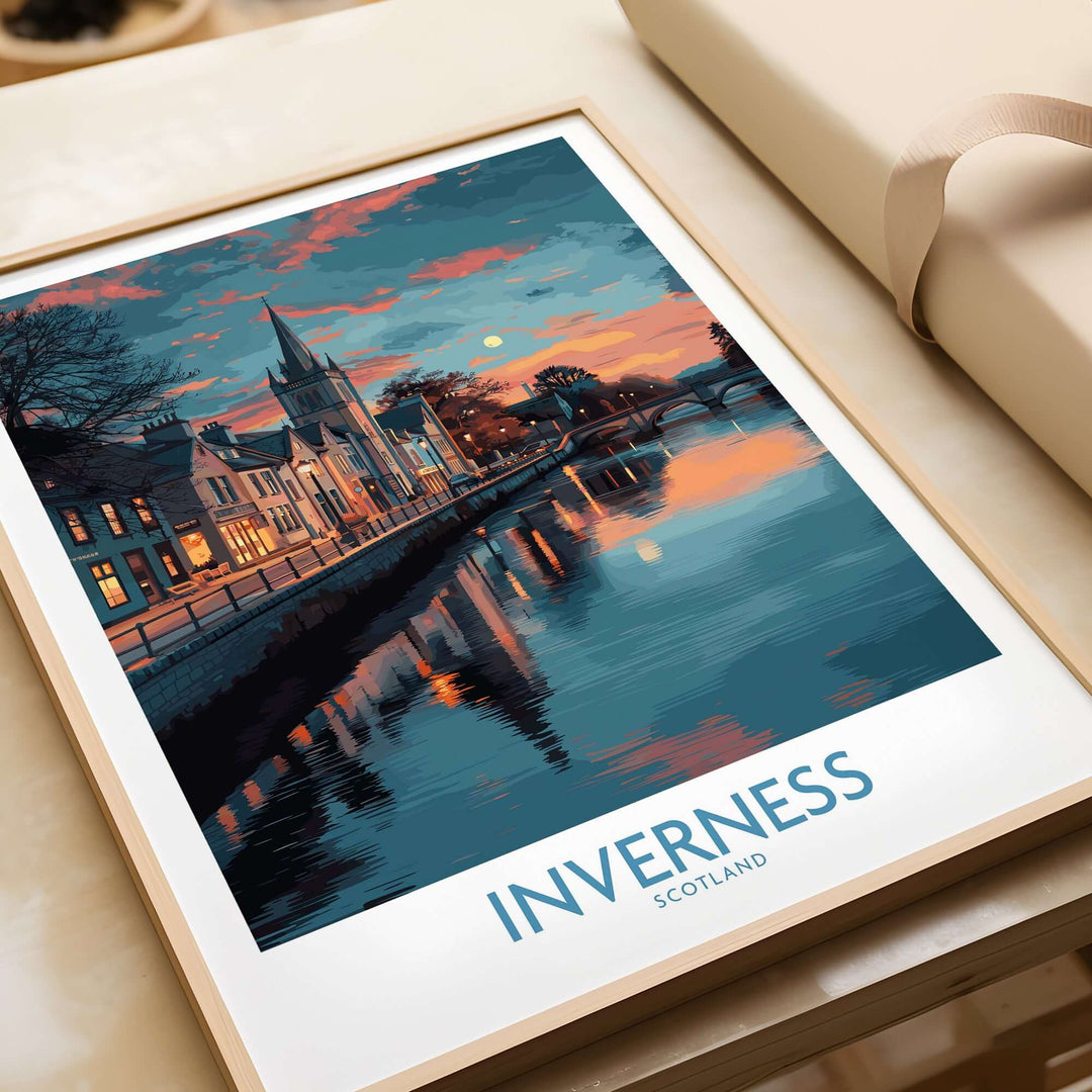 Inverness Scotland Sunset River Reflections Art Print | Twilight Cityscape Poster displayed in a frame on a table.