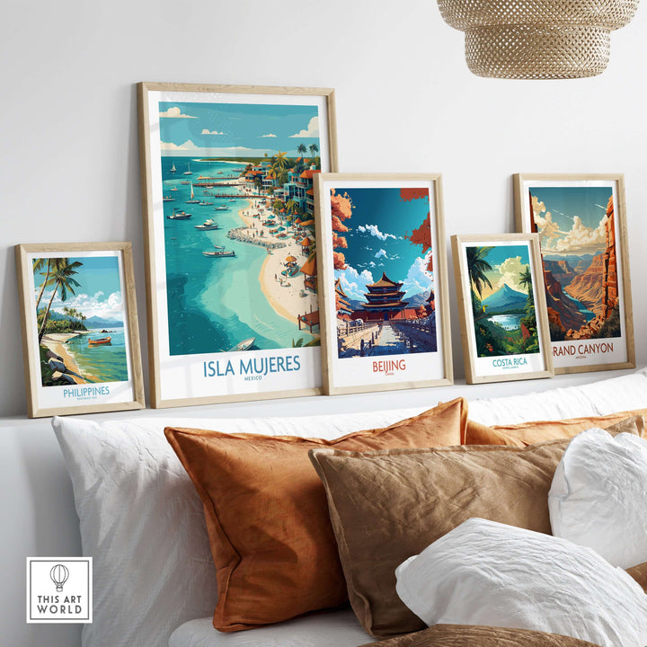 Colorful wall art including Isla Mujeres and travel prints from Beijing, Costa Rica, and the Philippines.