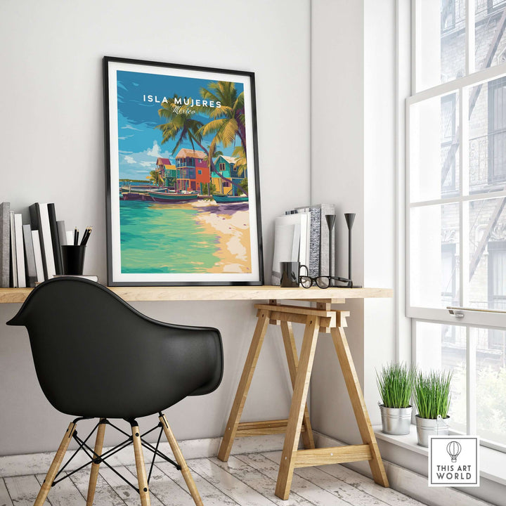 Isla Mujeres travel print framed on wall above black chair and desk, showcasing vibrant Mexico beach art.