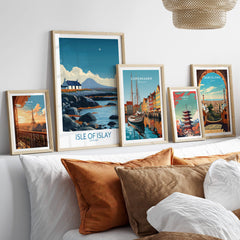 Isle of Islay Scotland Poster | Remote Scottish Coastal Scene Canvas Print displayed with other framed artworks on a stylish sofa.