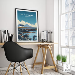 Isle of Islay Scotland Wall Art Print | Rocky Shore Travel Poster displayed in a modern room with a black chair and books.