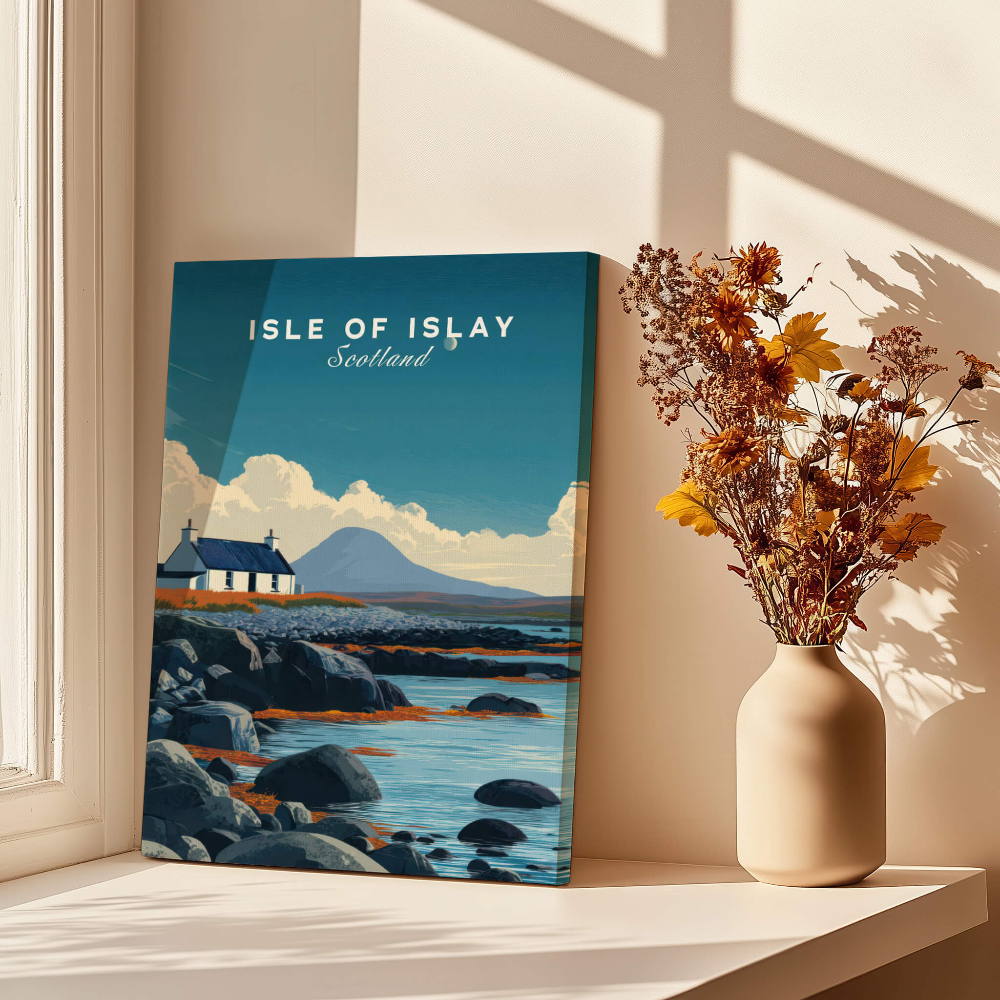 Isle of Islay Scotland Wall Art Print | Rocky Shore Travel Poster displayed near a vase of dried flowers.